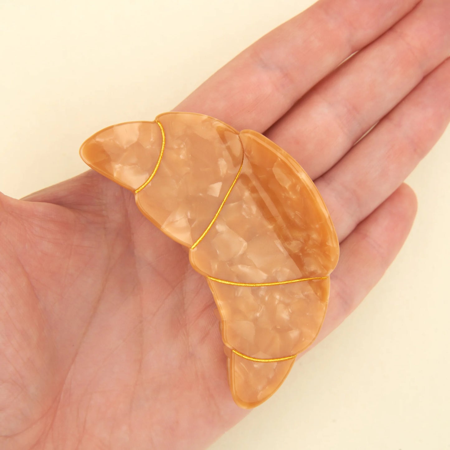 Pince à cheveux croissant