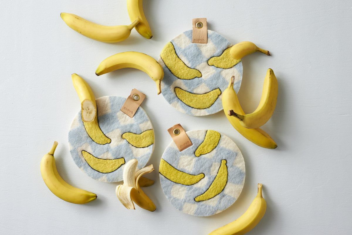 Dessous de plat Art Bananas Aveva 21 cm en laine mis en scène