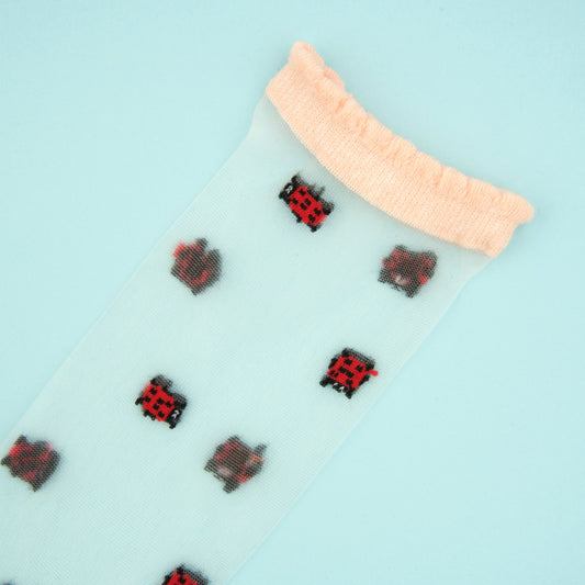Chaussettes transparentes Coccinelle Coucou Suzette porté