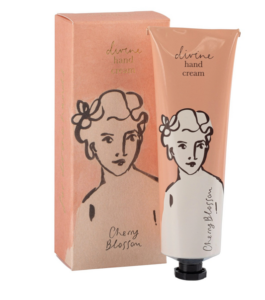 tube rose illustré d’une femme divine, crème hydratante Paris, parfum fleurs de cerisier, 75 ml.