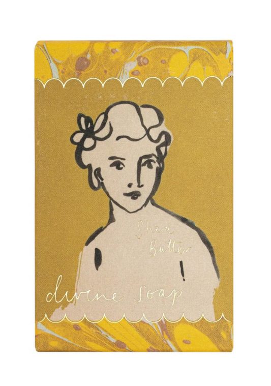 avon Shea Butter Archivist Gallery emballage illustré d'un croquis de femme
 luxe beurre de karité.