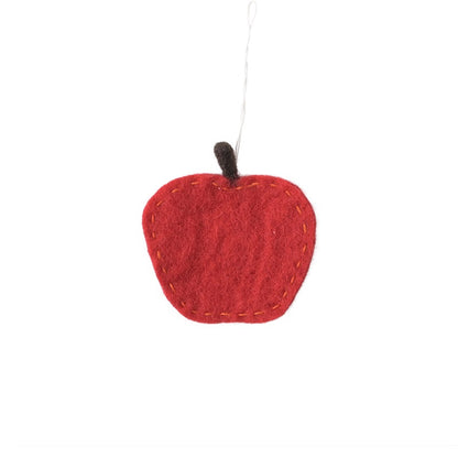 Pomme rouge Aveva en laine, décoration à suspendre sur fond blanc