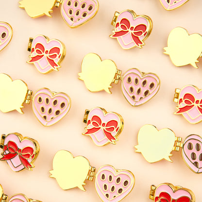 Pin's Boîte de chocolat Coucou Suzette en émail