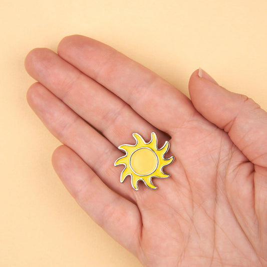 Pin's Soleil Coucou Suzette en émail