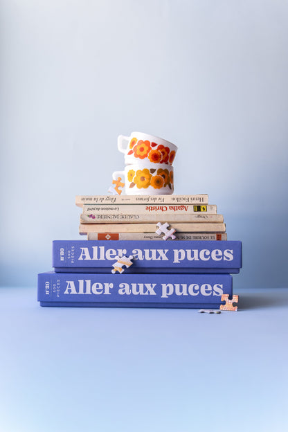 Puzzle Aller aux puces 500 pièces Jour Férié : boites livres empiles