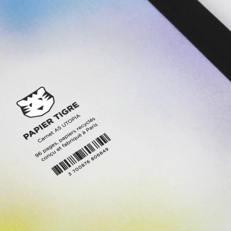 Étiquette et détail de la couverture pastel du carnet A5 Utopia