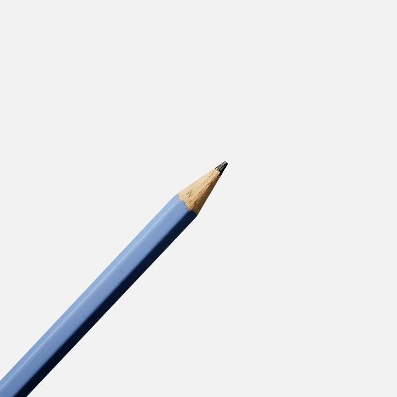 Détail de la mine du crayon bleu et jaune Papier Tigre