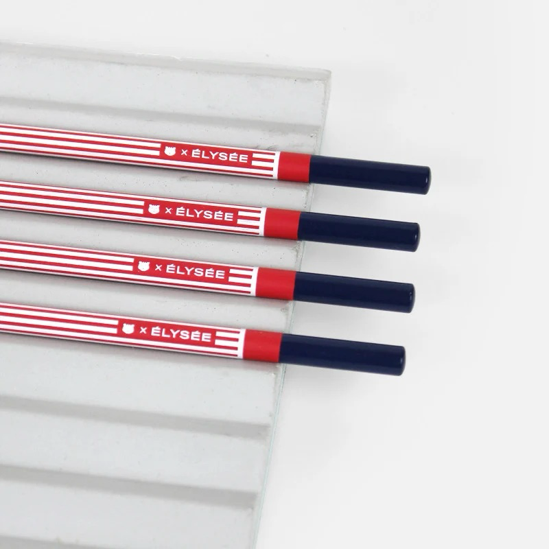 Lot de crayons Élysée Papier Tigre disposés sur un socle blanc