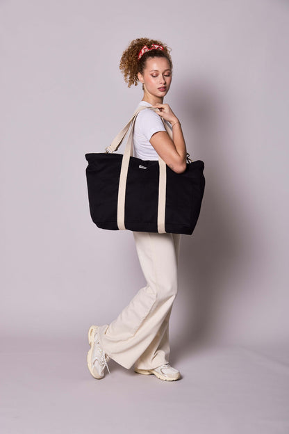 Sac de week-end Jean Noir Hindbag porté